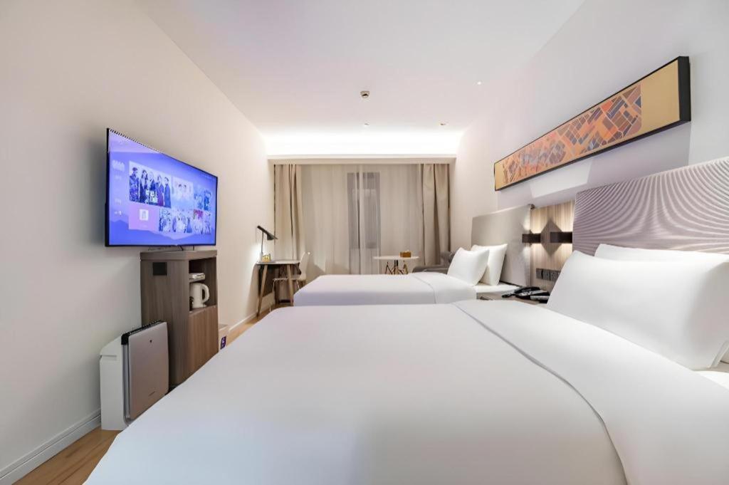 Hanting Hotel Shanghai Caohejing Yishan Road Экстерьер фото